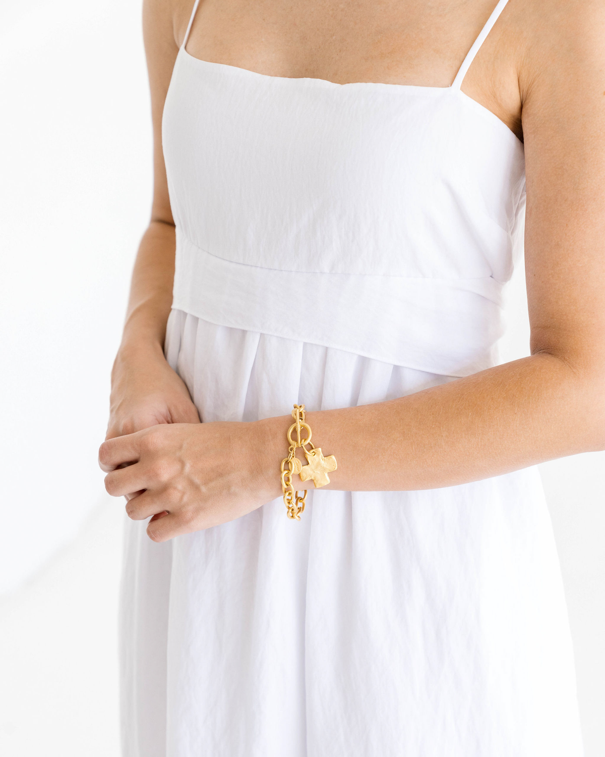 Cross Toggle Bracelet: Gold